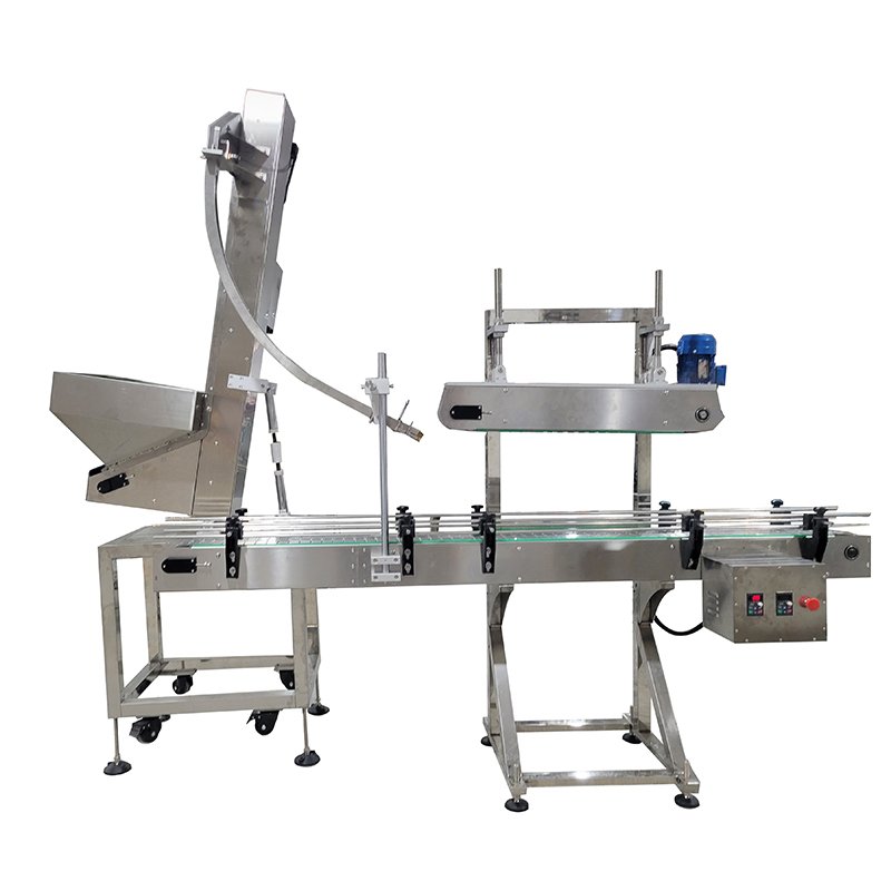 Automatic caps covering and pressing machine