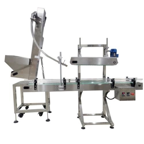 Automatic caps covering and pressing machine